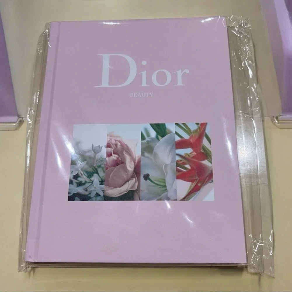 Dior Hardback Notebook still wrapped in paper.